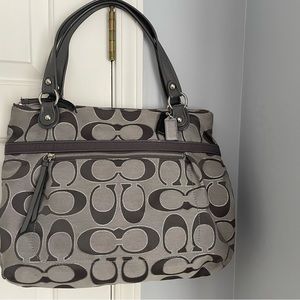 Coach Purse in gray/black signature logo pattern.